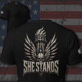 She Stands winged Liberty torch back print black tee from Infidel Collective