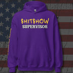 Purple hoodie with 'SHITSHOW SUPERVISOR' text on a textured background