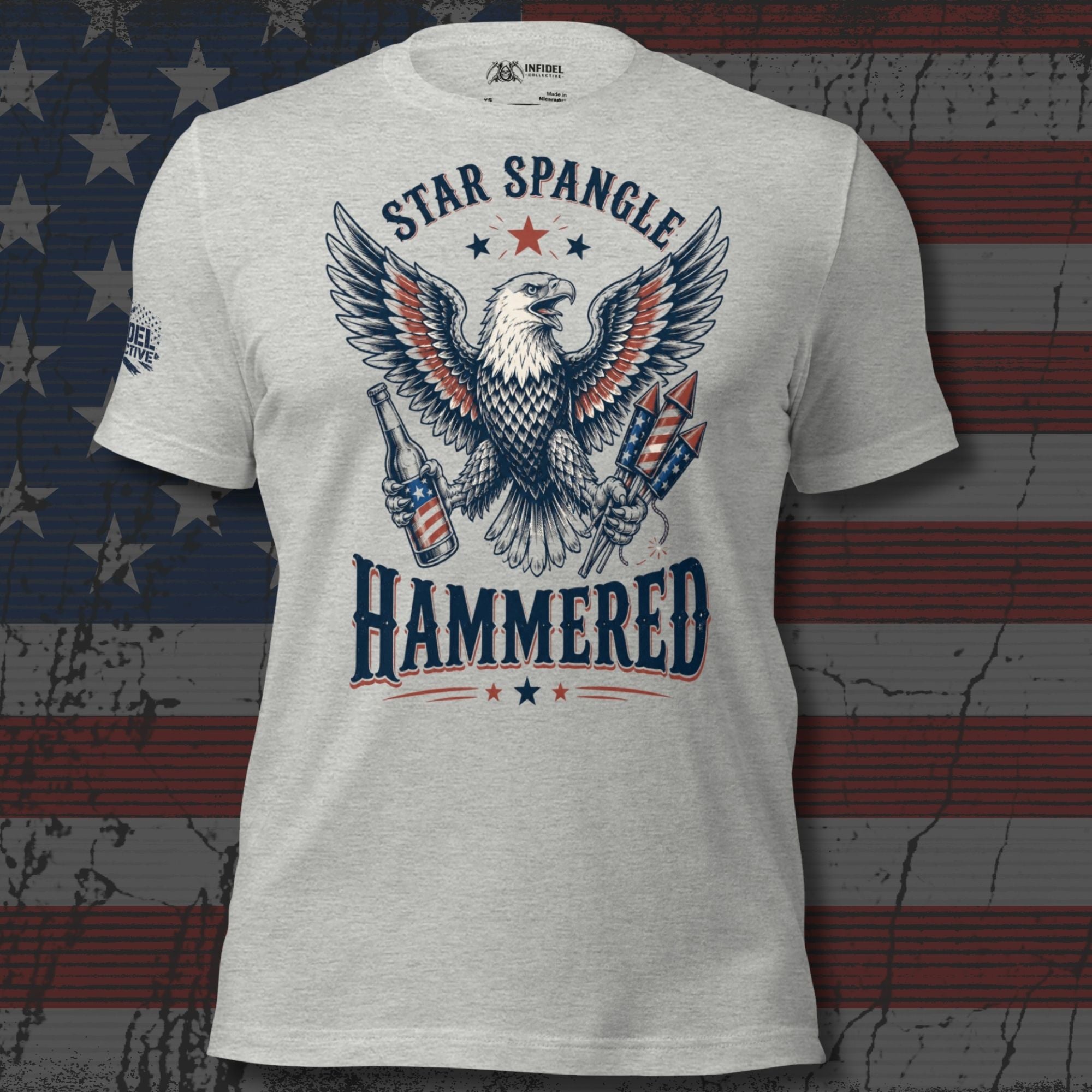 Star Spangle Hammered front print graphic on athletic heather tee featuring a bald eagle holding a beer bottle and patriotic fireworks rockets