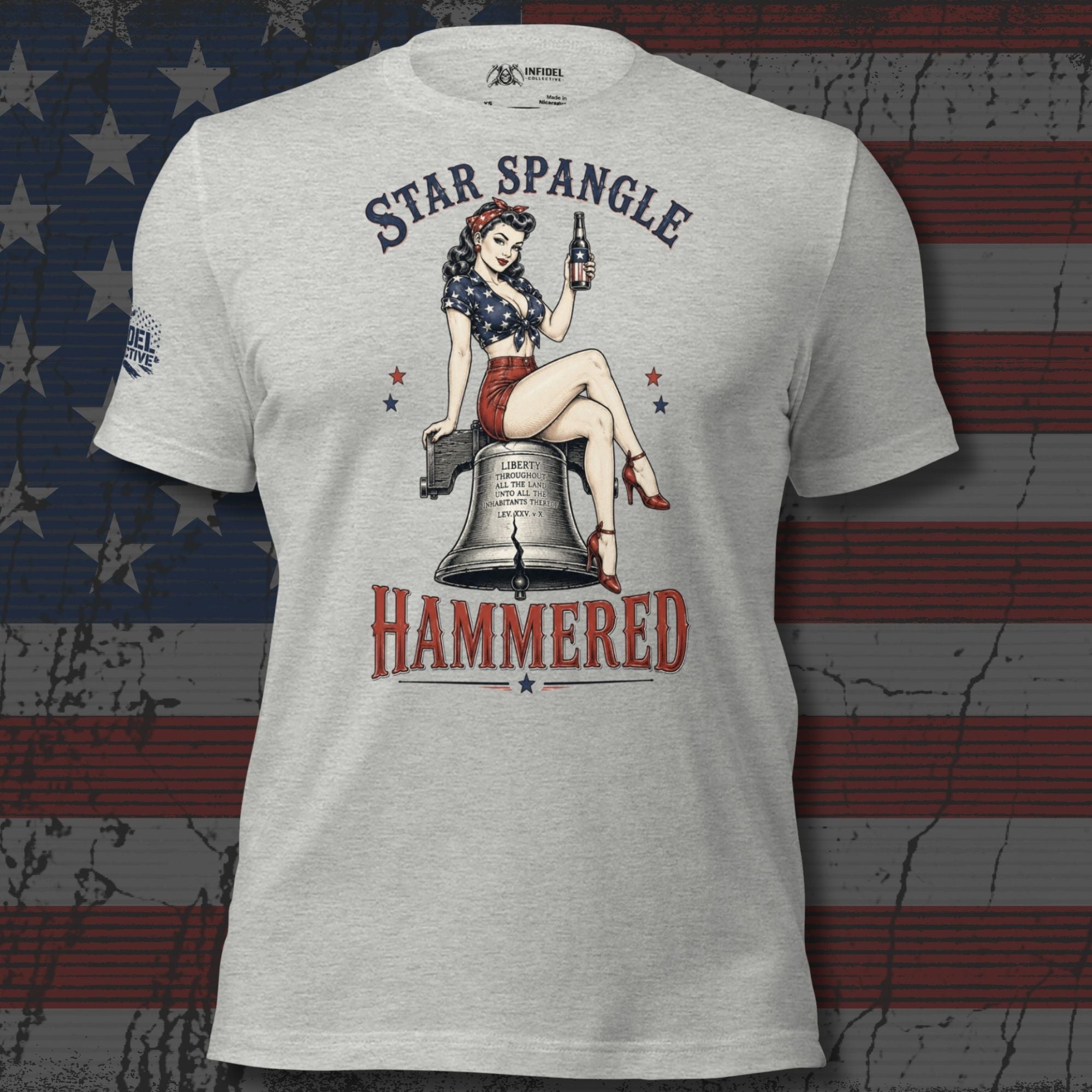 Star Spangle Hammered front print graphic on athletic heather tee featuring a patriotic pin-up woman sitting on the Liberty Bell holding a beer bottle