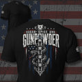 Sugar Spice and Gunpowder mechanical spine and handgun back print black tee from Infidel Collective