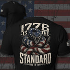 Black t-shirt with snake and '1776 is the Standard' design on a distressed American flag background