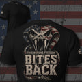 This Woman's Freedom Bites Back American flag cobra back print black tee from Infidel Collective