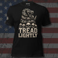 Tread Lightly coiled rattlesnake over stacked skulls design front print black tee from Infidel Collective