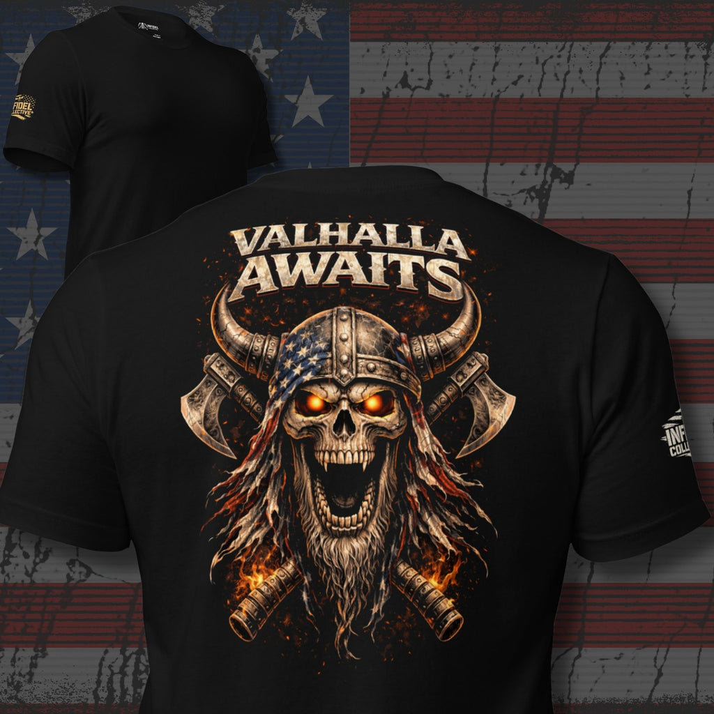 Black ghosted mockup with Viking skull and axes graphic and 'VALHALLA AWAITS' across the back of the tee, with a USA flag backdrop.