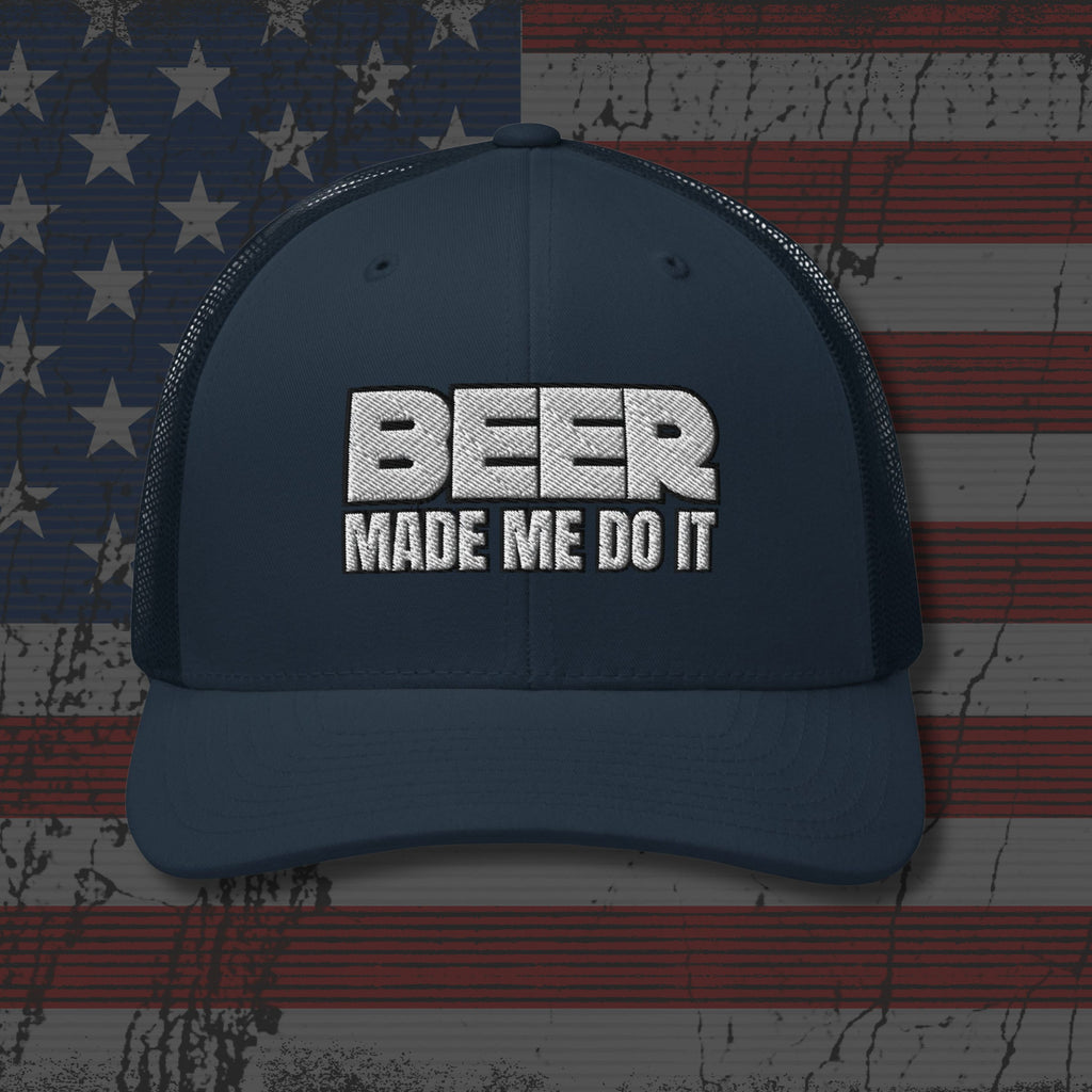Navy blue cap with 'BEER MADE ME DO IT' text on an American flag background
