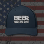 Navy blue cap with 'BEER MADE ME DO IT' text on an American flag background