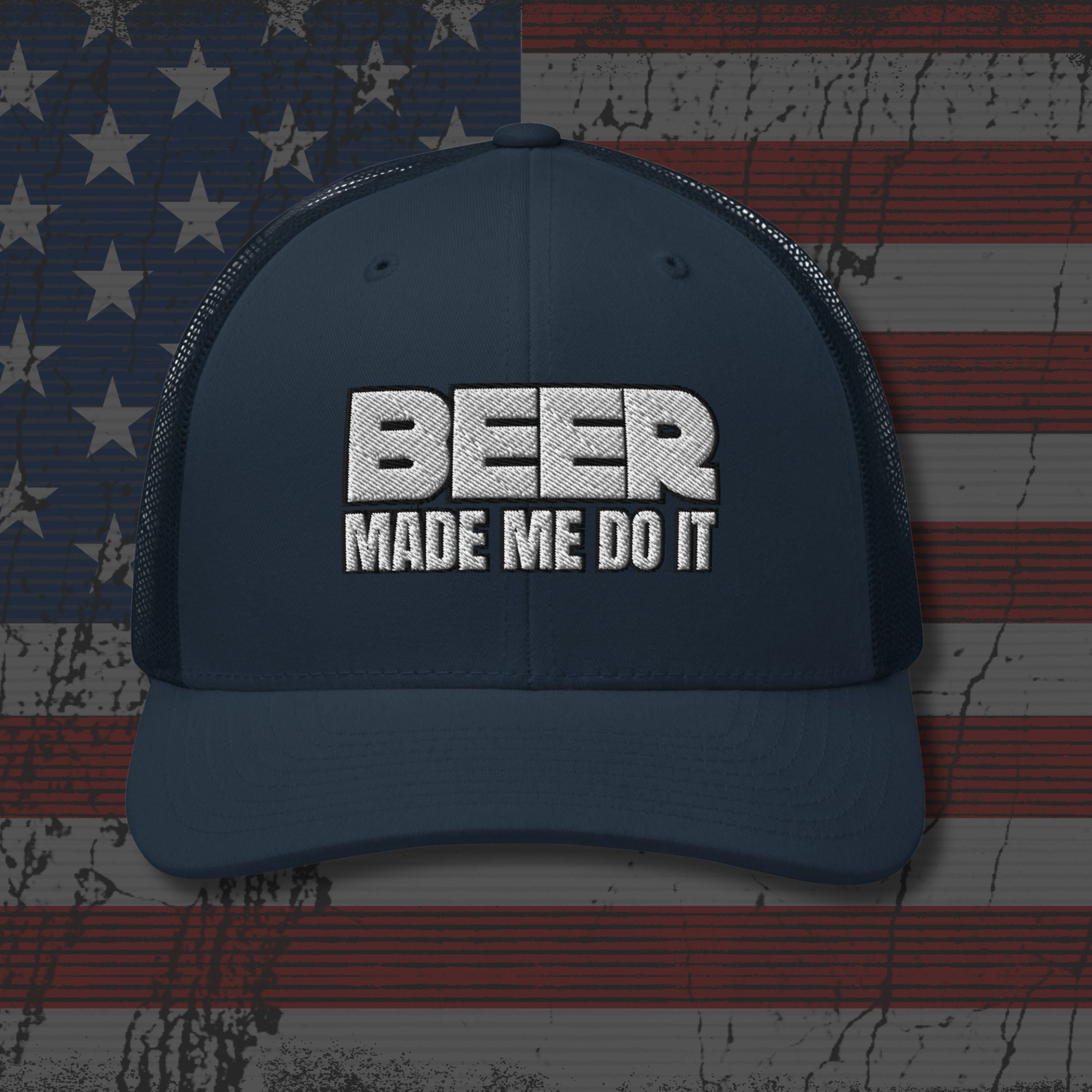 Navy blue cap with 'BEER MADE ME DO IT' text on an American flag background