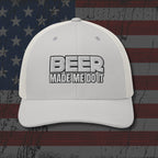 White cap with 'BEER MADE ME DO IT' text on an American flag background