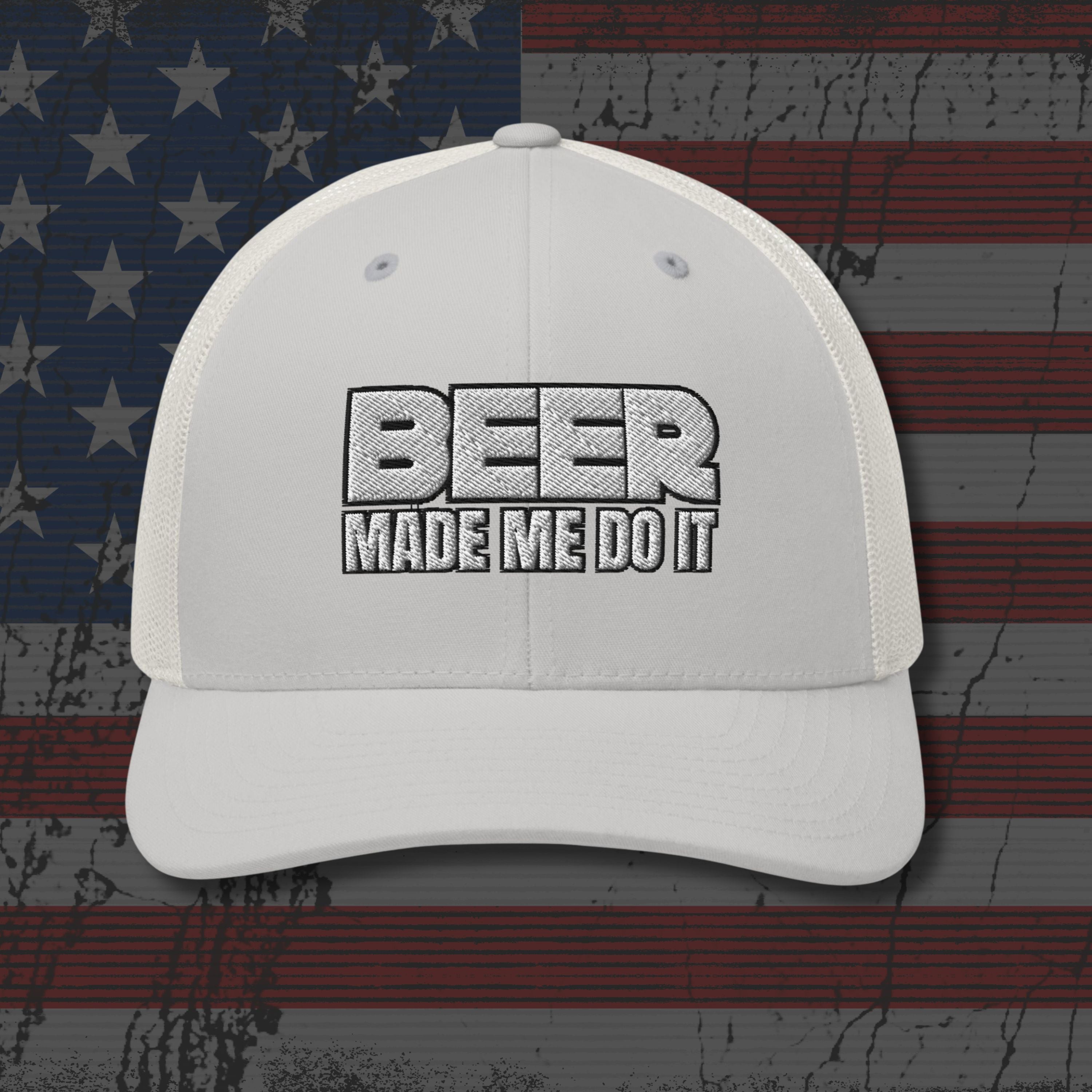 White cap with 'BEER MADE ME DO IT' text on an American flag background
