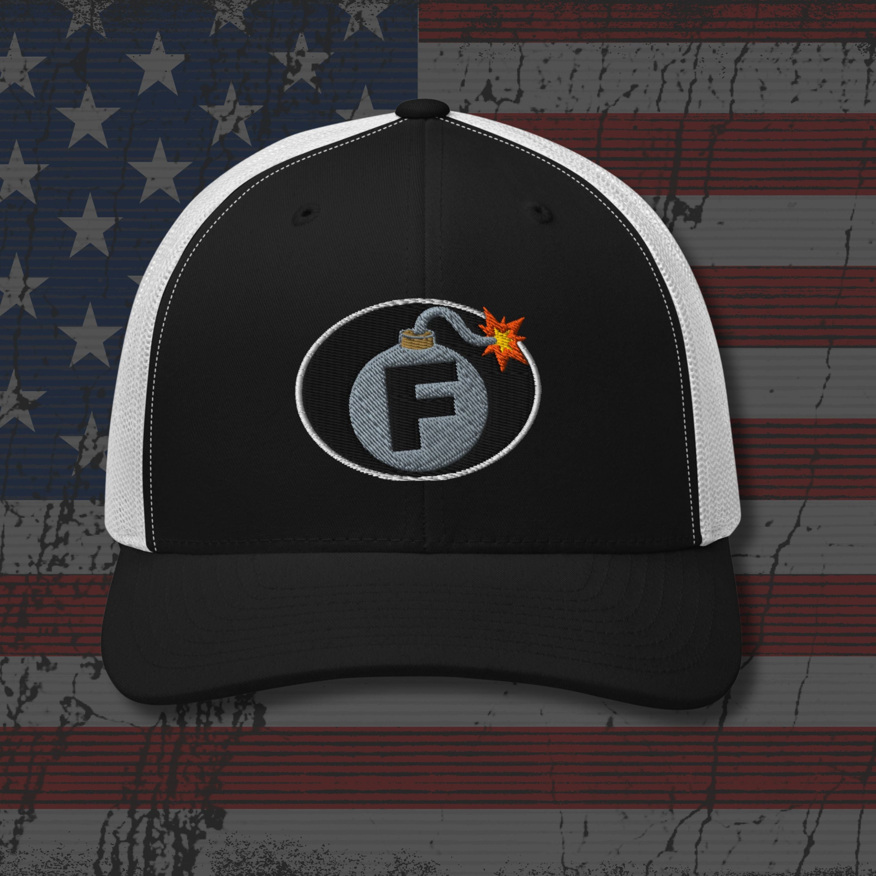 Black and white cap with a logo on an American flag background