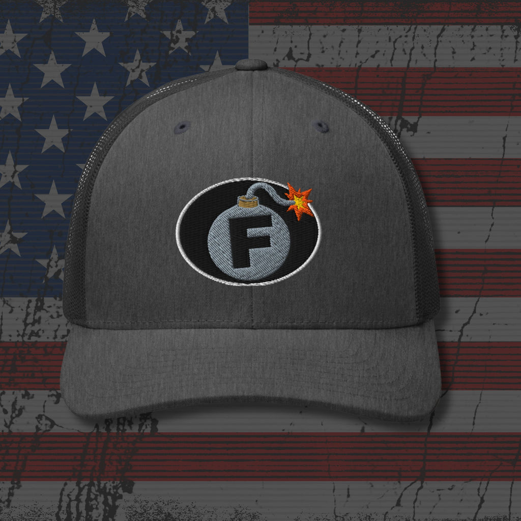 Gray cap with a bomb-themed logo on an American flag background