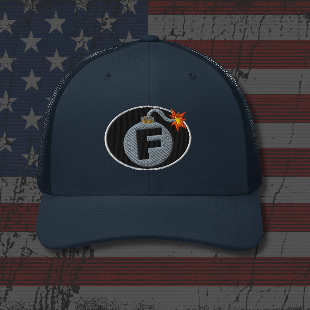 Navy blue cap with a bomb graphic featuring the letter 'F' on an American flag background