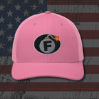 Pink cap with a bomb graphic featuring the letter 'F' on an American flag background