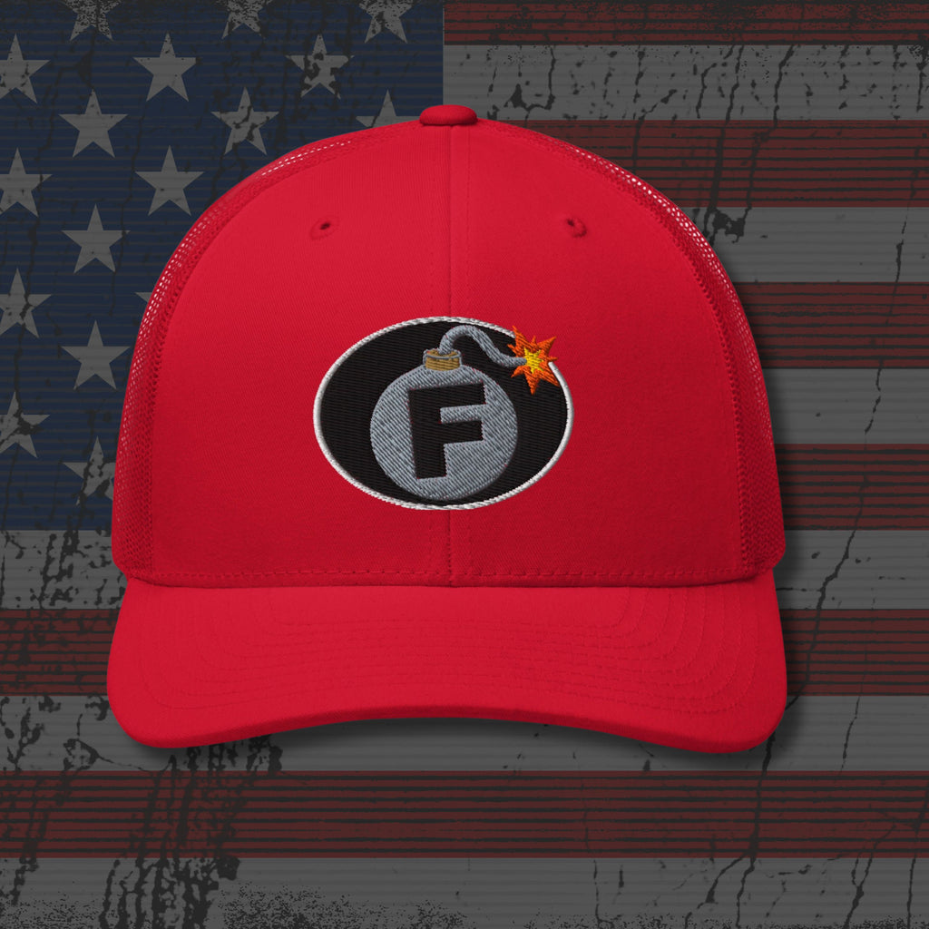 Red cap with a bomb graphic featuring the letter 'F' on an American flag background
