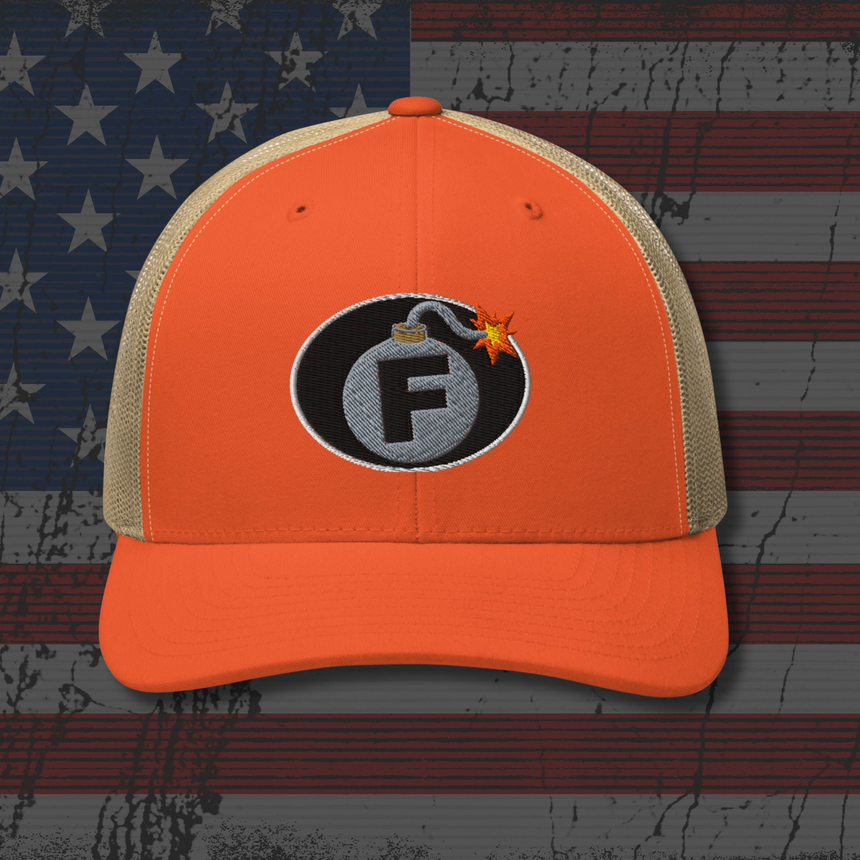Orange cap with a bomb graphic featuring the letter 'F' on an American flag background