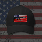 Black cap with American flag patch on a distressed American flag background