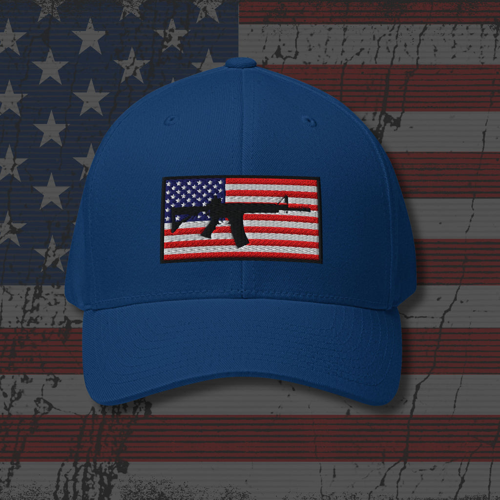 Blue cap with American flag and gun design on a distressed American flag background