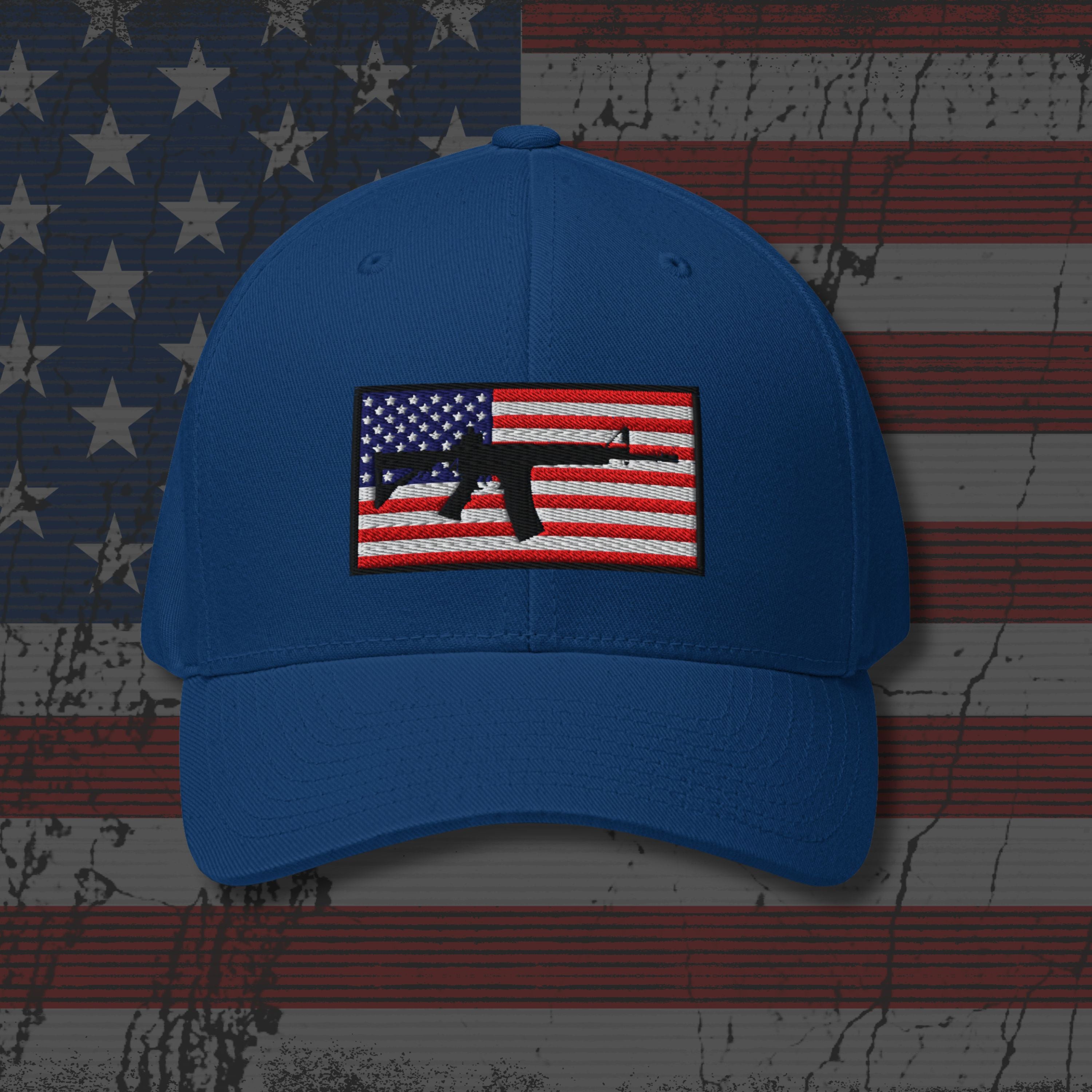 Blue cap with American flag and gun design on a distressed American flag background