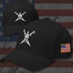 Two black baseball caps shown on a distressed American flag background. Each cap features a white embroidered crossed-sword helmet logo on the front and a small American flag patch on the side.