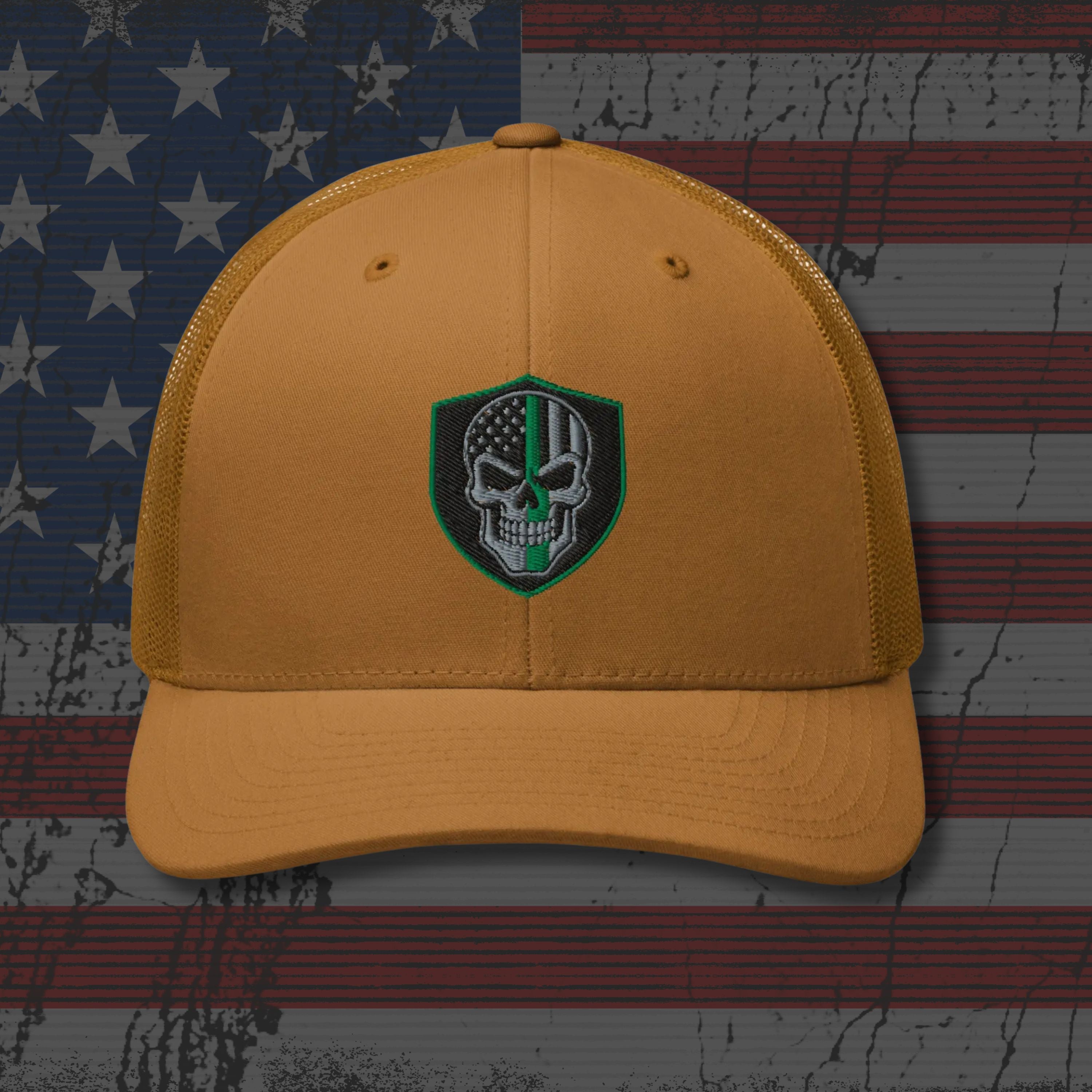 Yellow cap with a skull emblem on an American flag background
