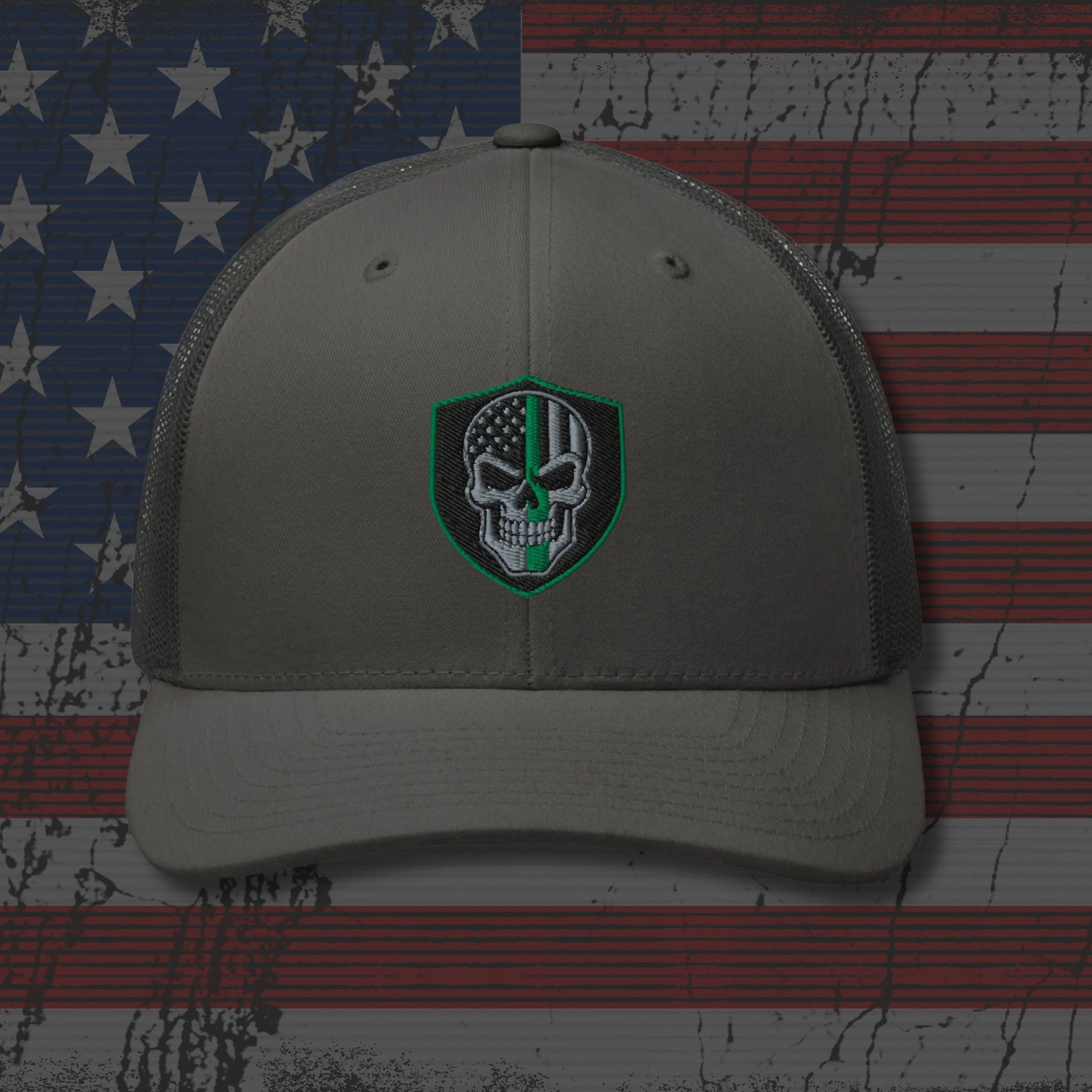 Gray cap with a skull emblem on an American flag background