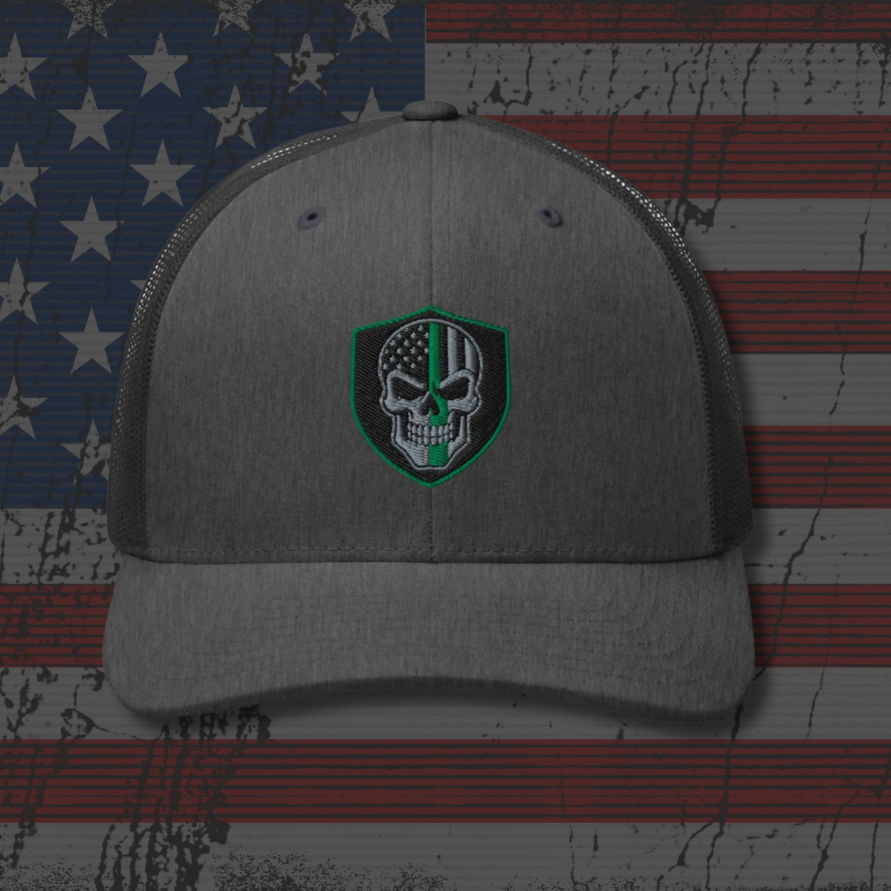 Gray cap with a skull and crossbones design on an American flag background