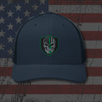 Blue cap with a skull emblem on an American flag background