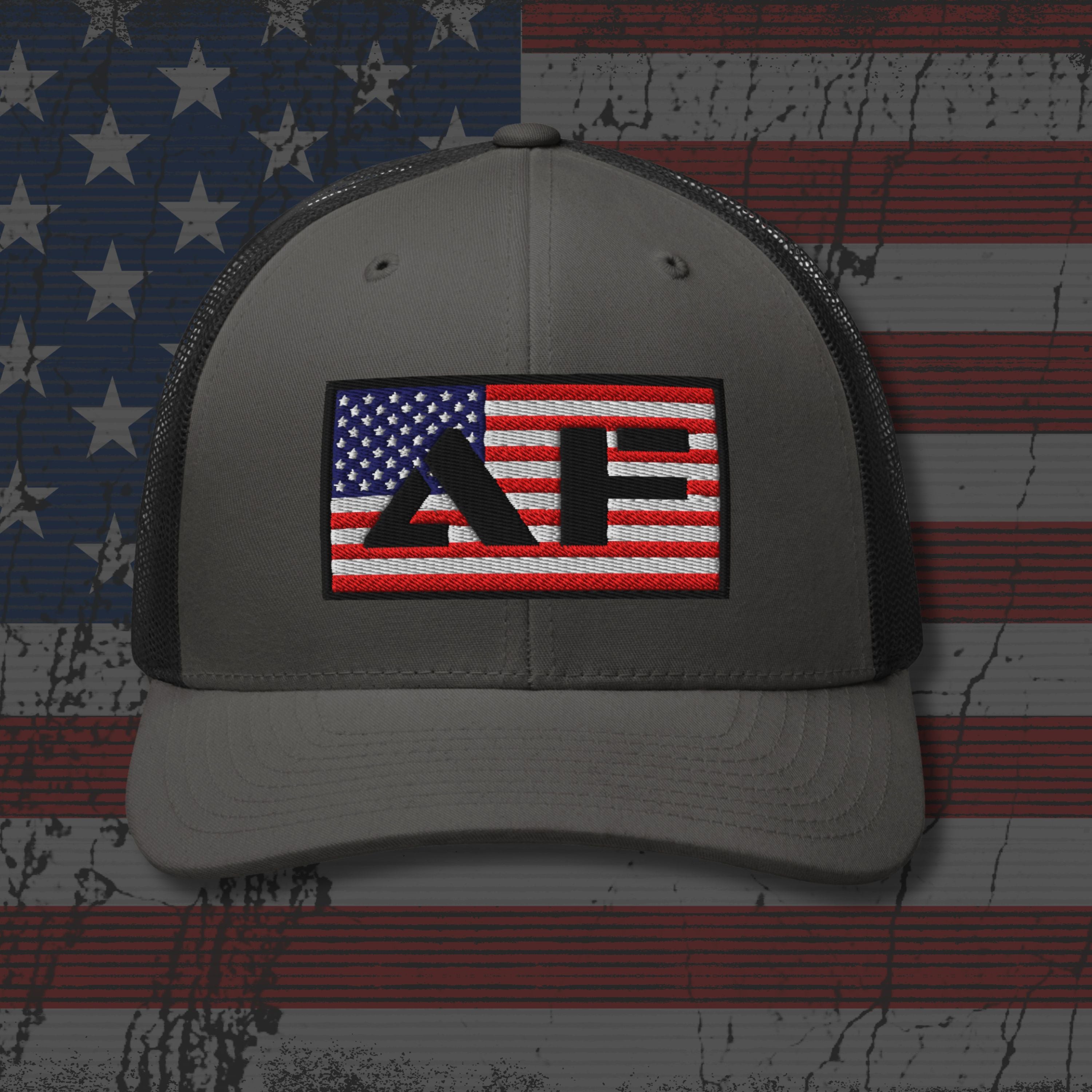 Gray cap with American flag logo on a distressed American flag background