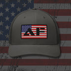 Gray cap with a flag patch on an American flag background