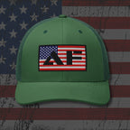 Green cap with a logo on an American flag background