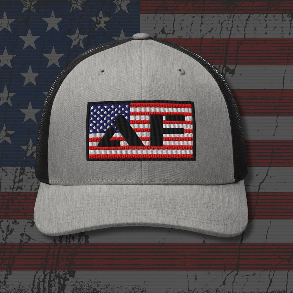 Gray cap with American flag logo on a distressed American flag background