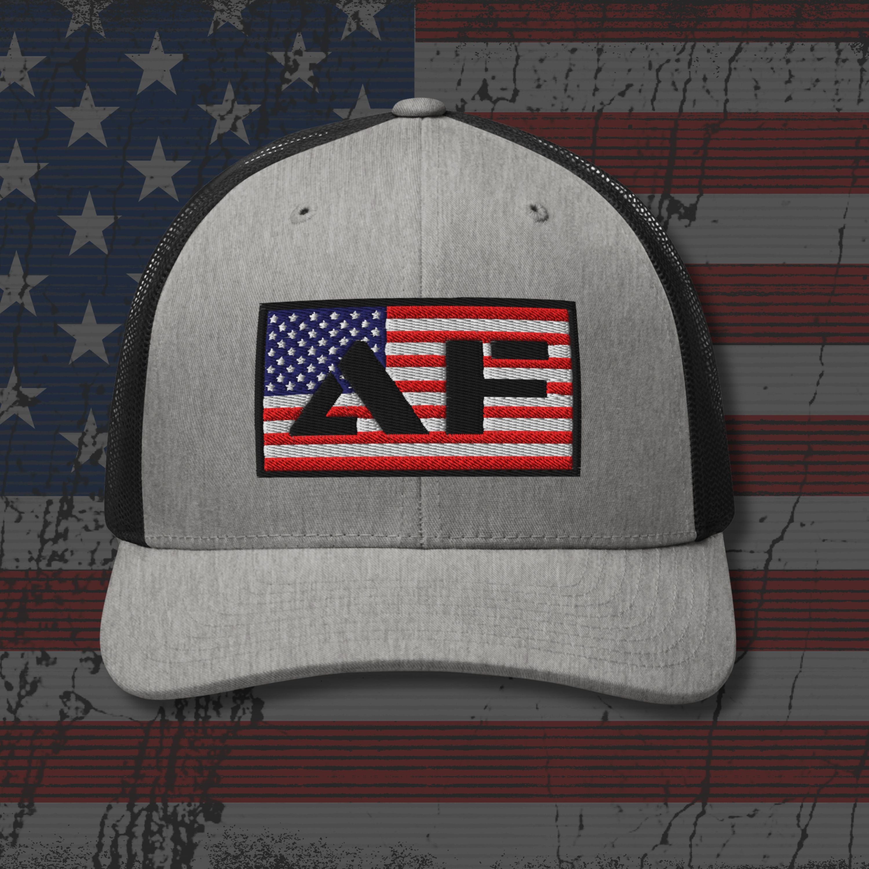 Gray cap with American flag logo on a distressed American flag background