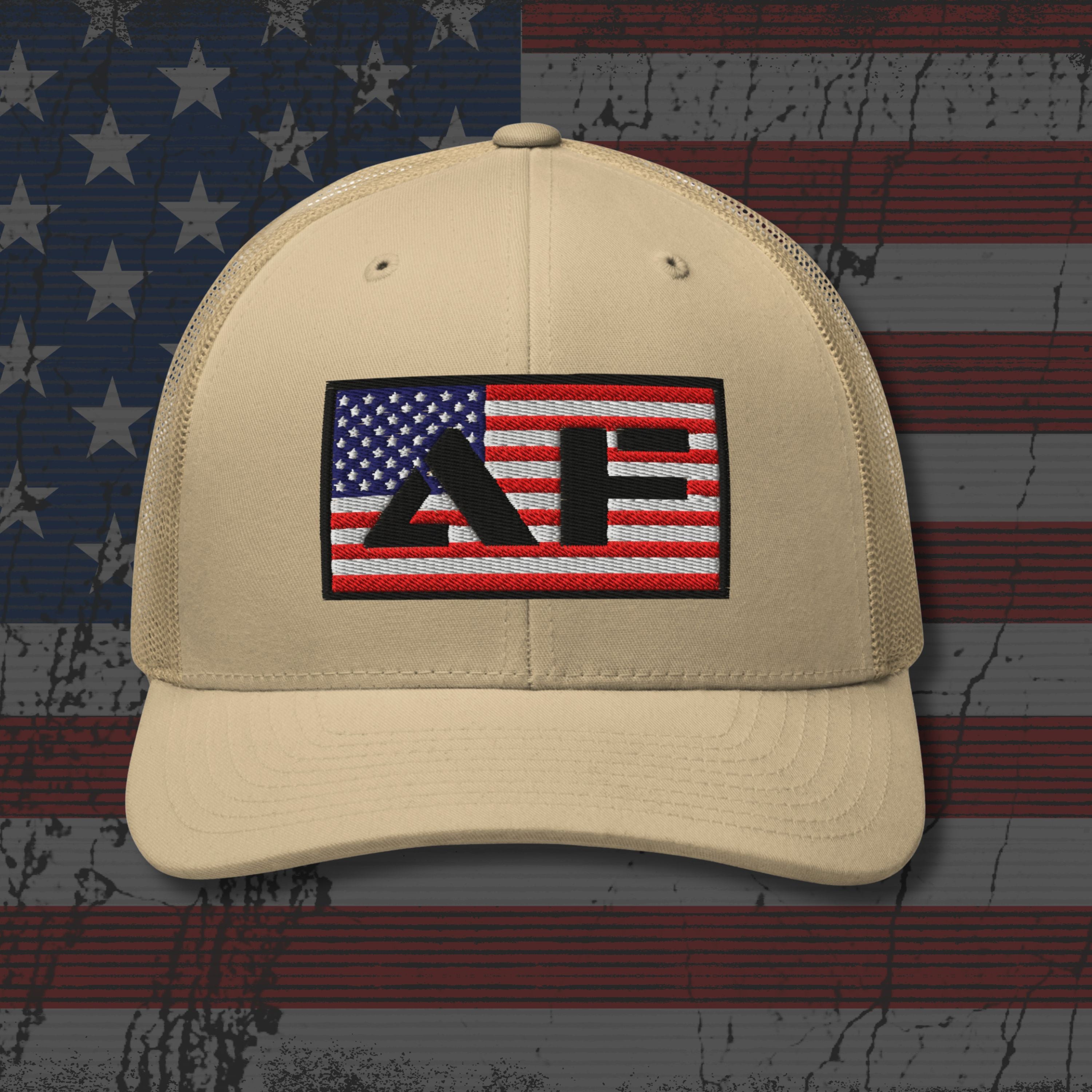 Beige cap with American flag design on a distressed American flag background