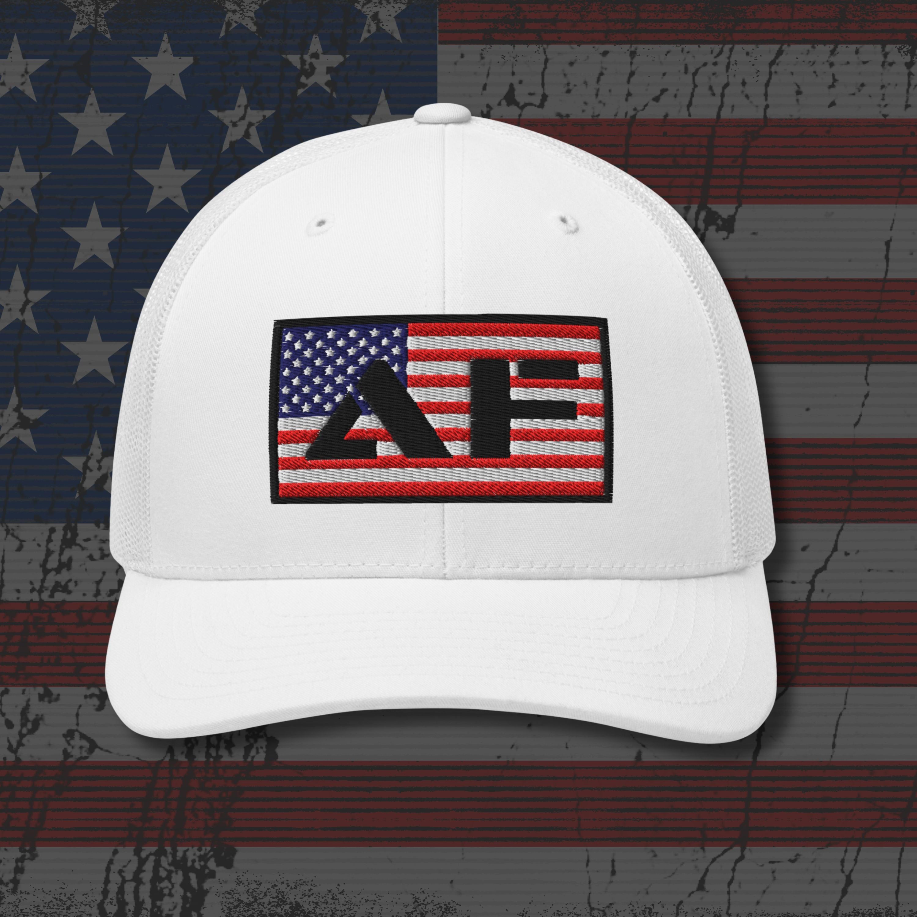 White cap with a flag patch on an American flag background