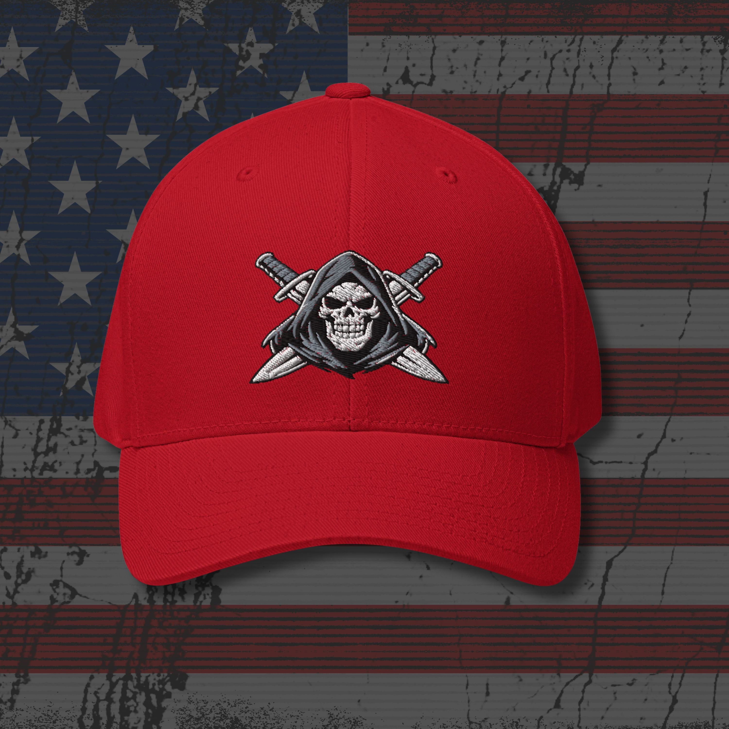 Red cap with a skull and crossed swords design on an American flag background