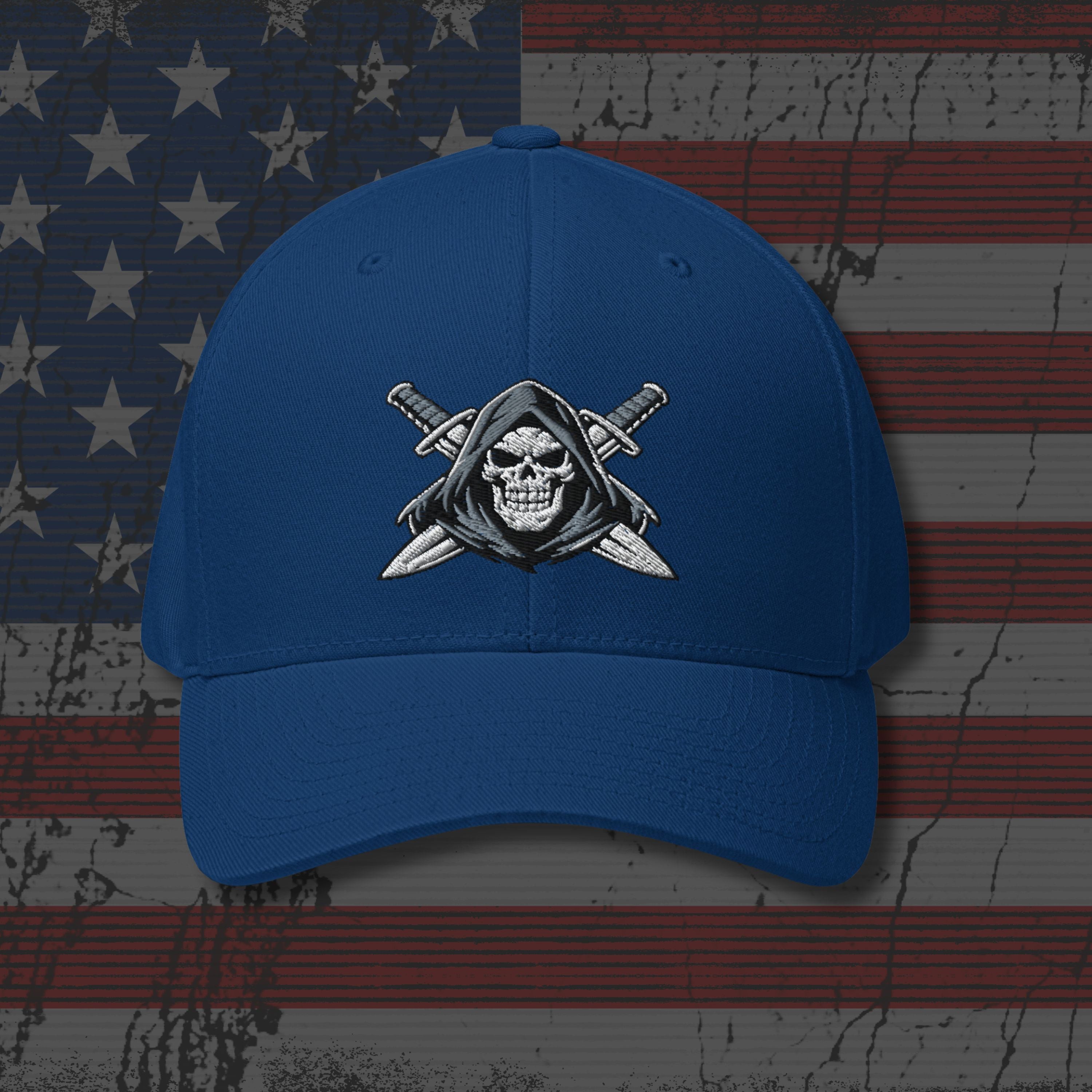 Blue cap with a skull and crossed swords emblem on an American flag background