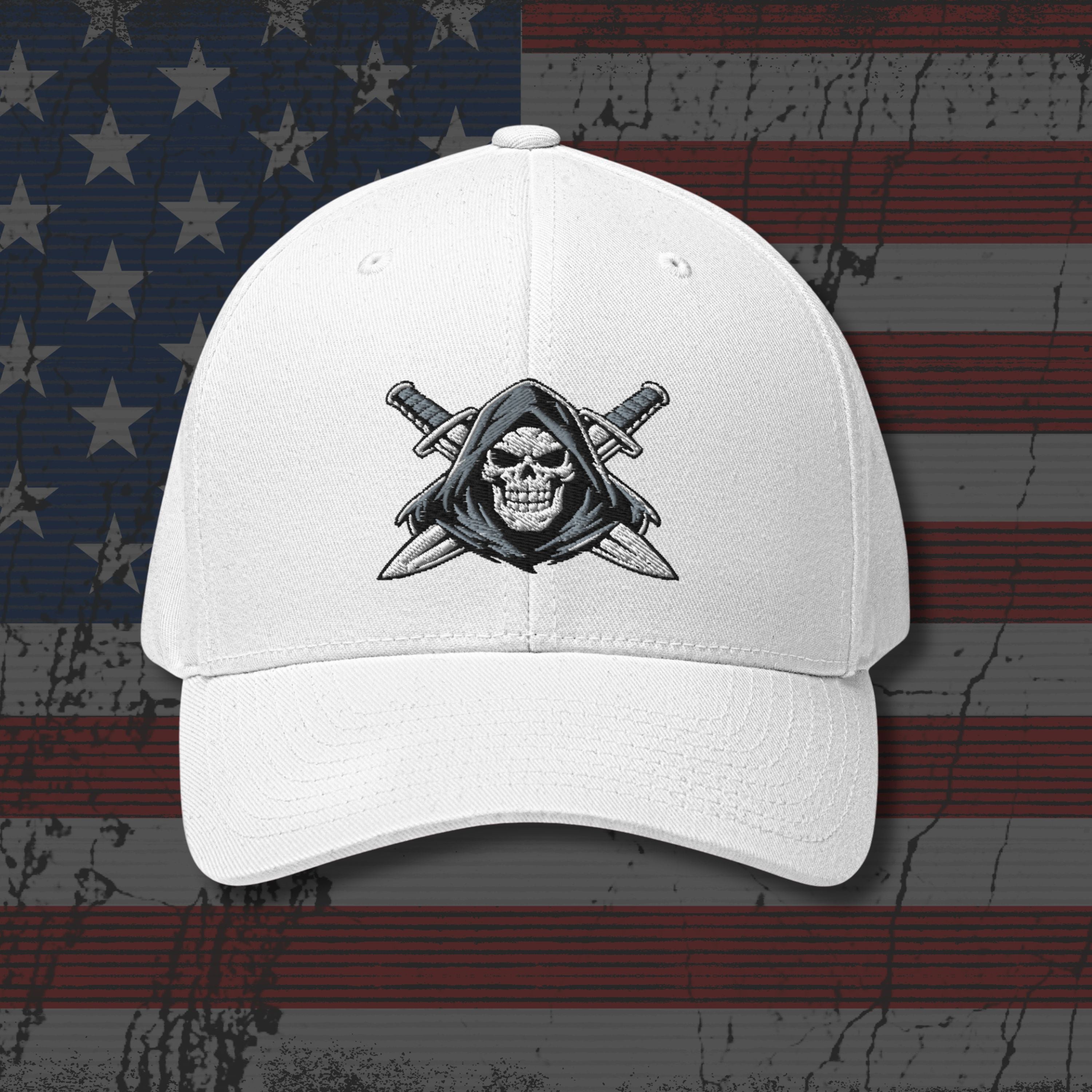 White cap with a skull and crossed swords design on an American flag background