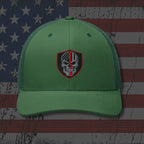 Green cap with a skull emblem on an American flag background