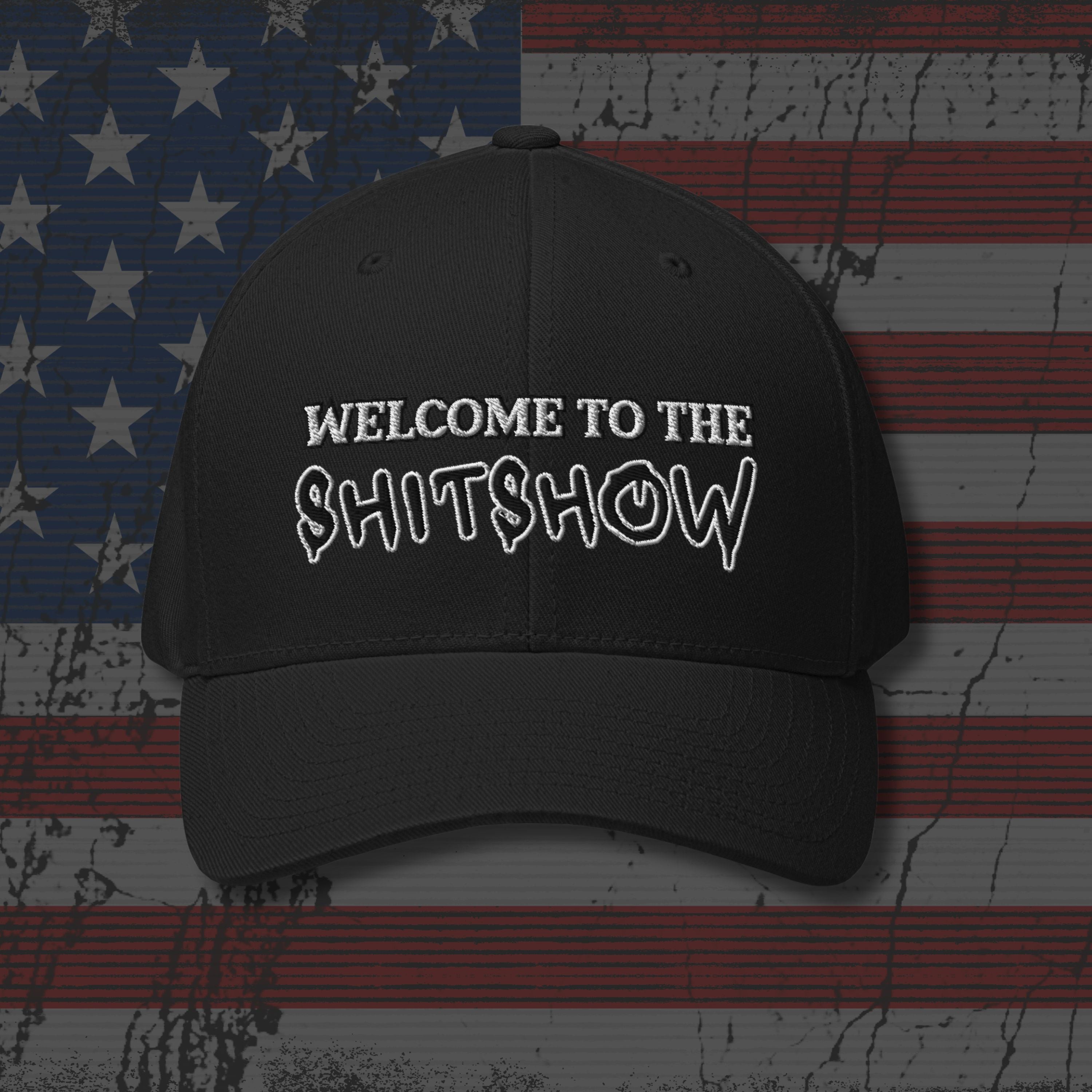 Black cap with 'WELCOME TO THE SHITSHOW' text on an American flag background