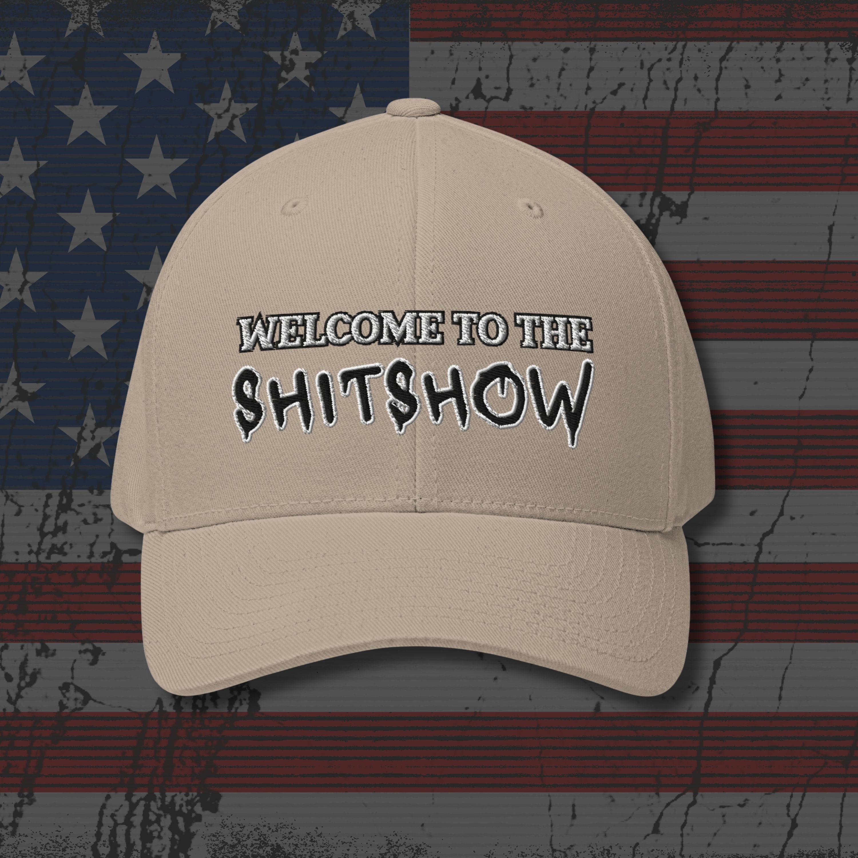 Beige cap with 'Welcome to the Shitshow' text on an American flag background