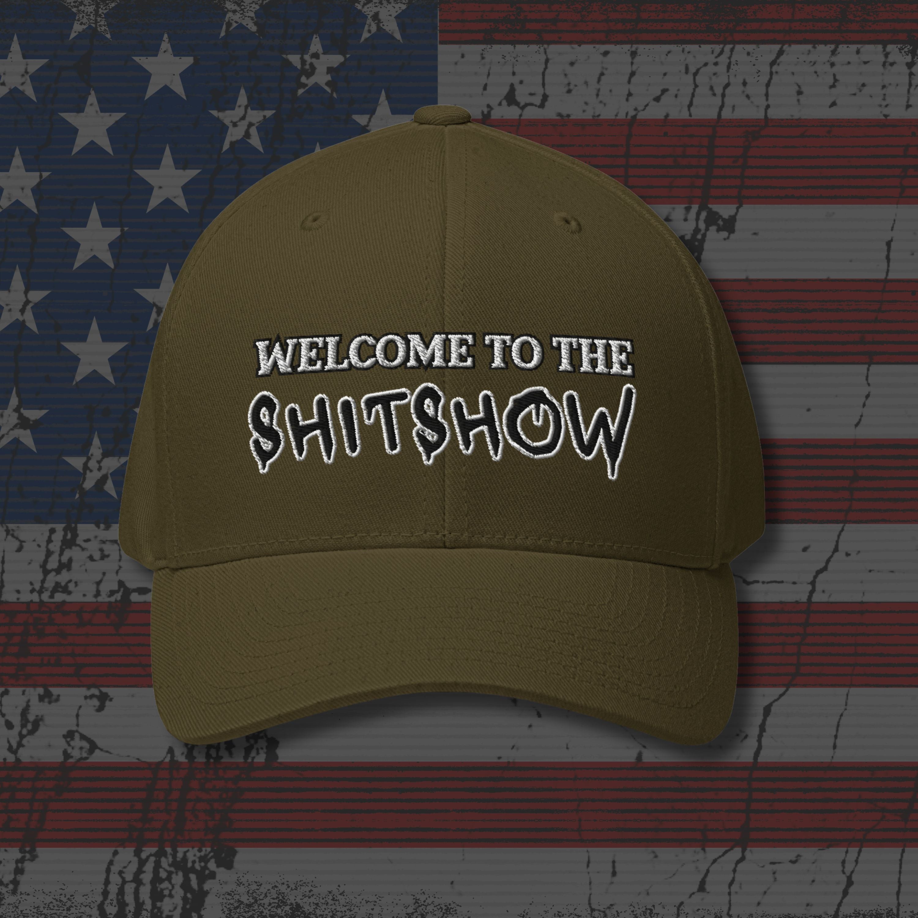 Brown cap with 'WELCOME TO THE SHITSHOW' text on an American flag background