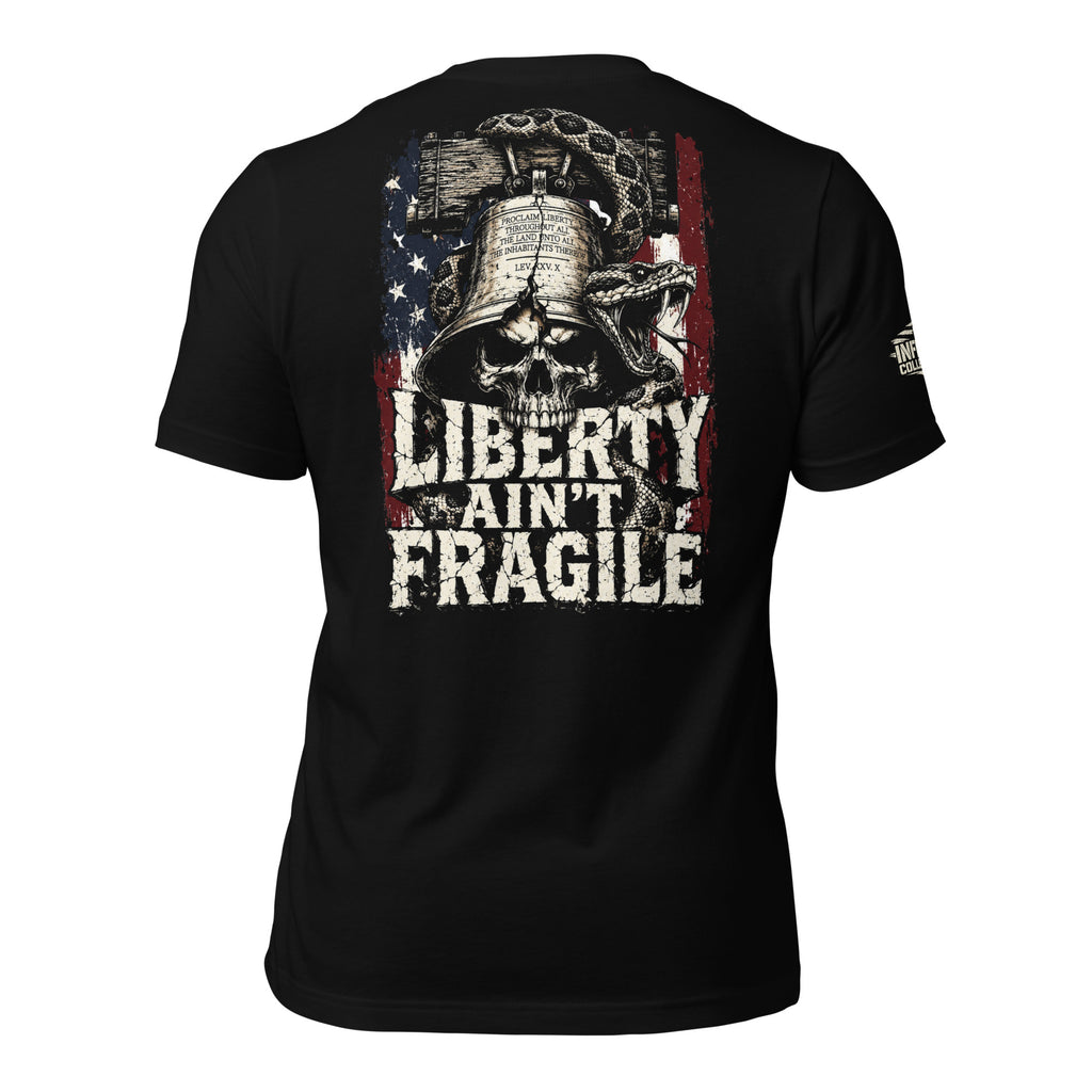 Black tee with back print featuring a skull under the Liberty Bell, a rattlesnake, distressed American flag graphic, and the text Liberty Ain't Fragile
