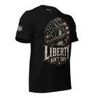 Black tee with front print featuring a rattlesnake wrapped around the Liberty Bell, distressed American flag graphic, and the text Liberty Ain't Soft