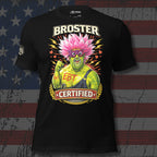 Black t-shirt with colorful graphic design featuring a character with pink hair and 'Broster Certified' text on an American flag background.