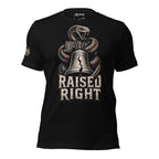 Black tee with front print featuring a rattlesnake wrapped around the Liberty Bell and the text Raised Right