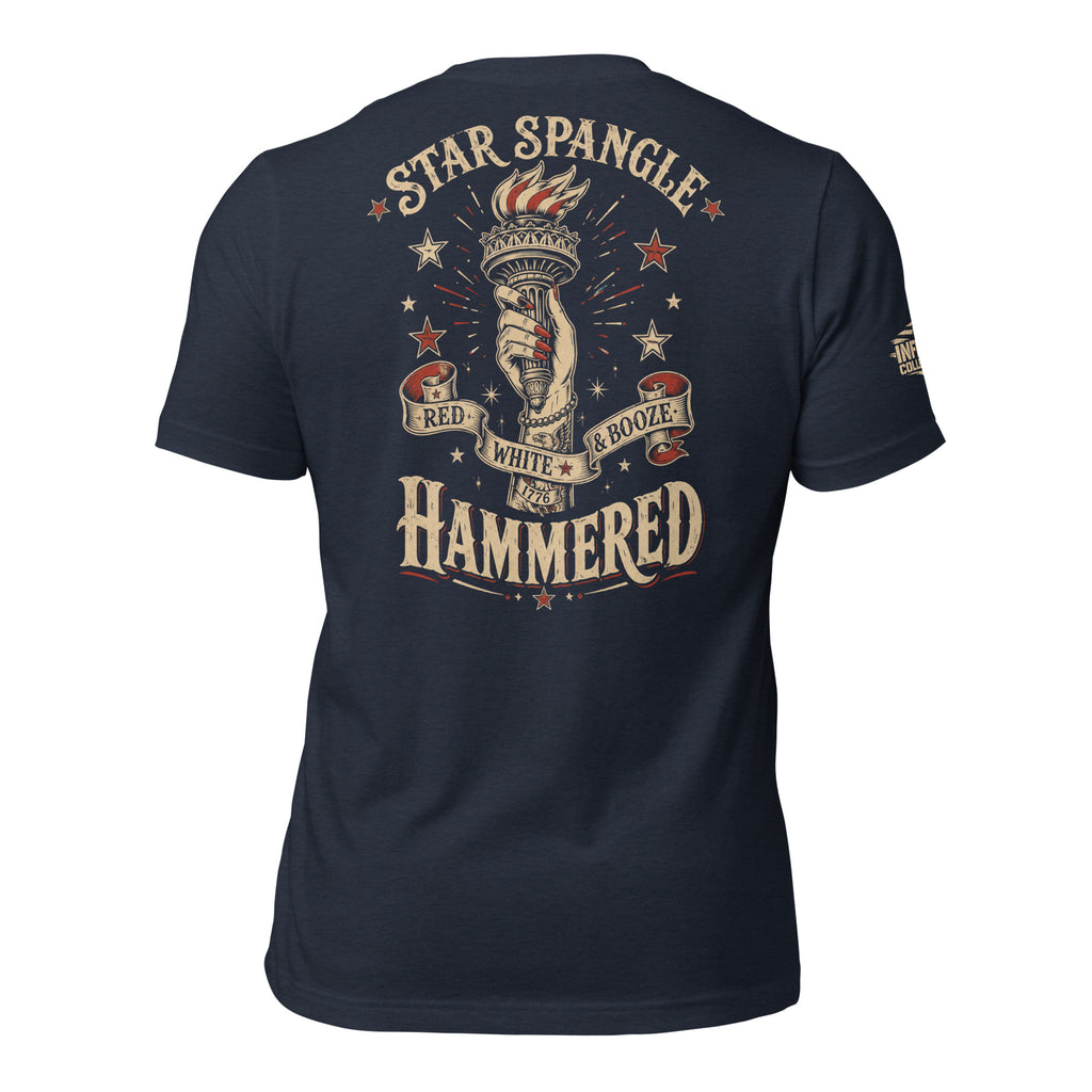 Red White and Booze Hammered back print graphic on navy tee featuring a hand holding the Statue of Liberty torch with patriotic stars and vintage lettering
