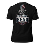 Black tee with back print featuring a rattlesnake wrapped around the Statue of Liberty torch and the text She Don't Bend in distressed patriotic lettering
