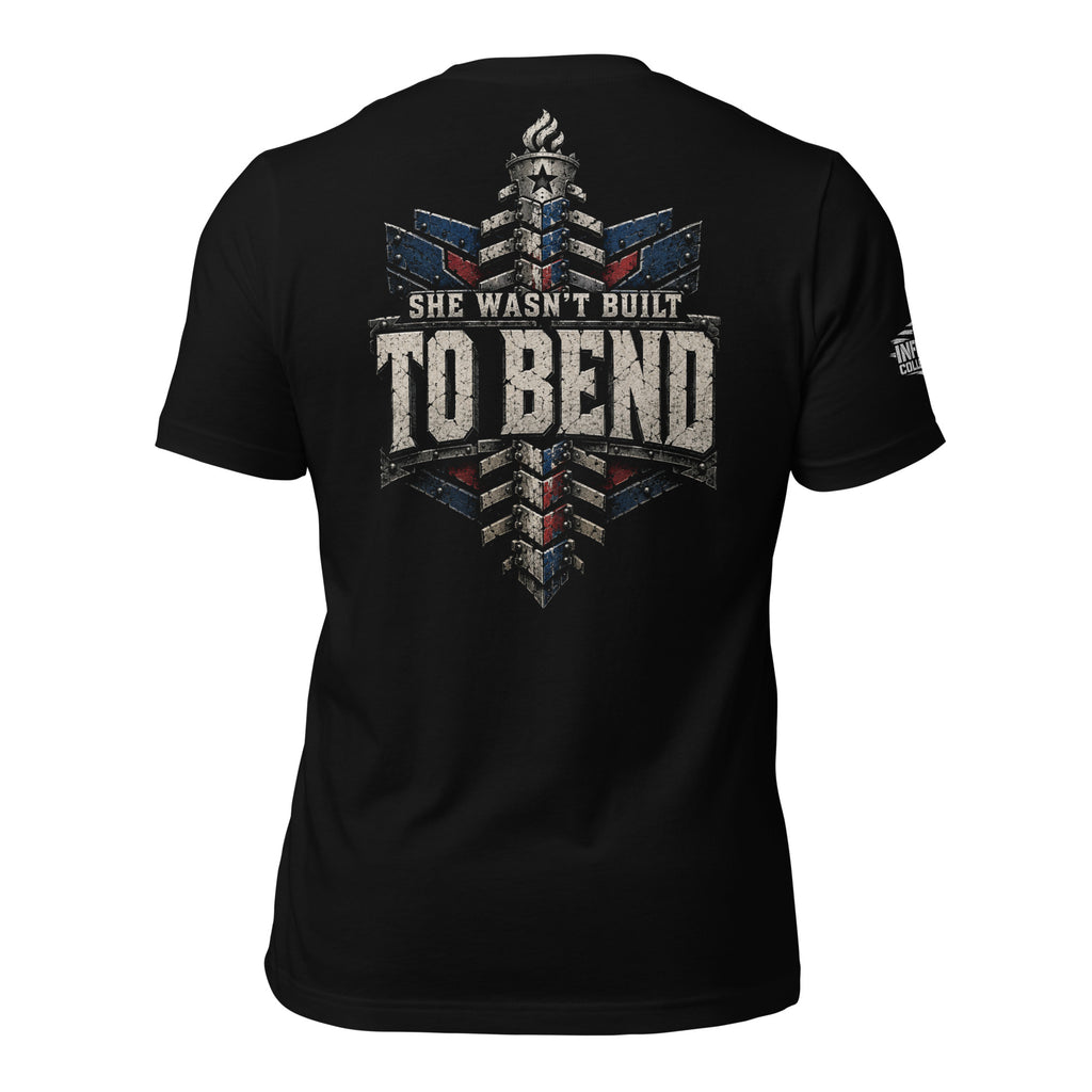 She Wasn't Built To Bend back print graphic on black tee featuring a patriotic spine design with distressed lettering and torch detail