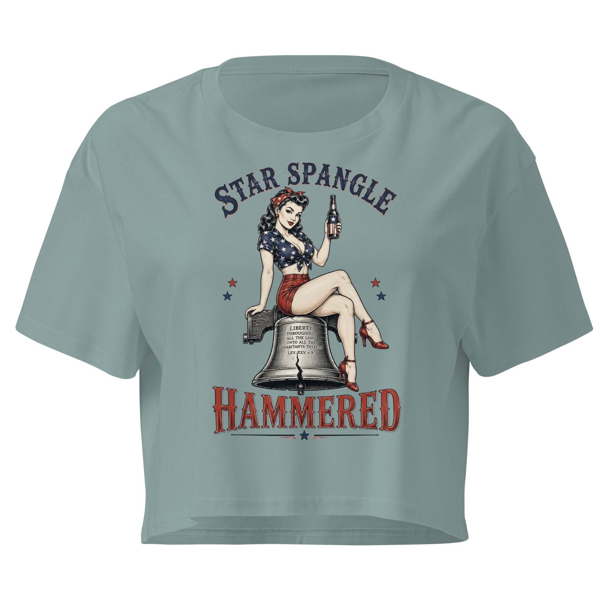 Patriotic pinup woman sitting on the Liberty Bell holding a beer with Star Spangle Hammered text on mineral blue front print tee
